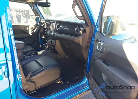 2023 Jeep Wrangler 4-Door Sahara Altitude 4X4 z USA, uszkodzony, nr VIN 1C4HJXEG9PW666649